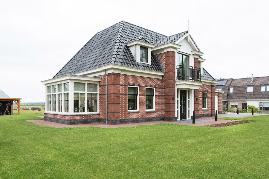 Landelijk klassiek kozijn in renovatieproject door Knipping